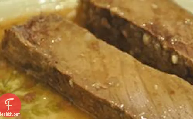 شريحة لحم مطهو ببطء مع الليمون والثوم