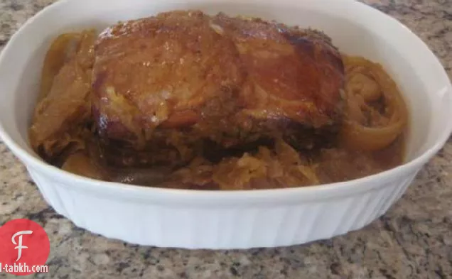 طباخ بطيء (وعاء من الفخار) لحم الخنزير الخاصرة المشوي والكراوت