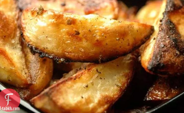 البطاطا اليونانية (محمصة بالفرن ولذيذة!)