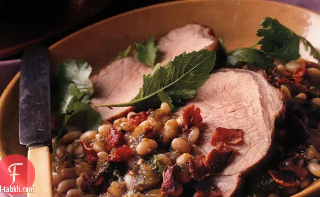 توماتيلو-لحم خنزير مطهو ببطء مع الفاصوليا البيضاء ولحم الخنزير المقدد
