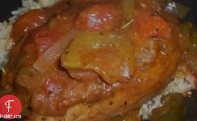 شرائح لحم الخنزير الطماطم ط