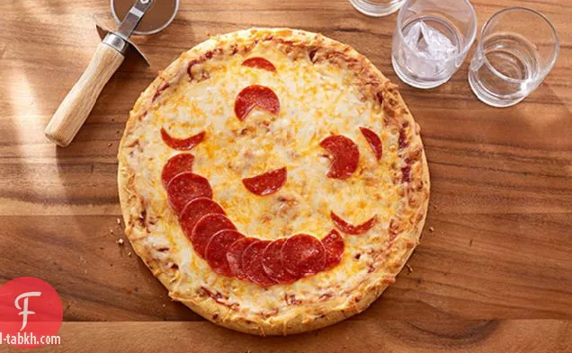 بيتزا وجه سعيد