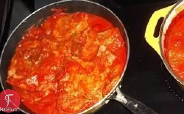 قطع الطماطم ط