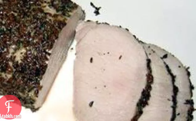 الخاصرة لحم الخنزير مع قشرة الكراوية