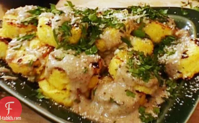 عصيدة من دقيق الذرة المشوي مع صلصة موريل