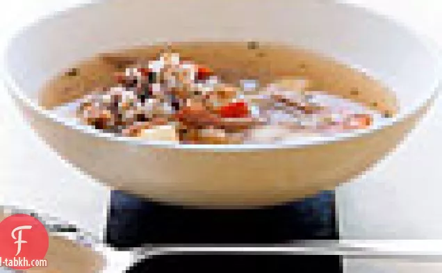 حساء الشعير مع كونفيت البط والخضروات الجذرية