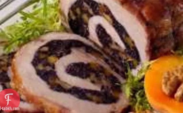 خاصرة لحم الخنزير المحشوة بالأرز المحرم والمشمش وحشو الجوز