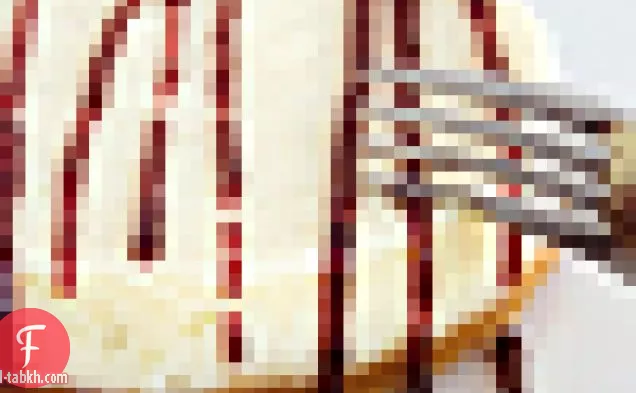 تشيز كيك بالليمون مع صلصة بلاك بيري
