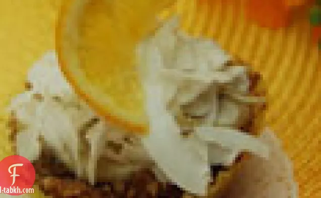 الليمون بودنغ شغل الكعك جوز الهند مع حلق جوز الهند تحتل المرتبة الاولى