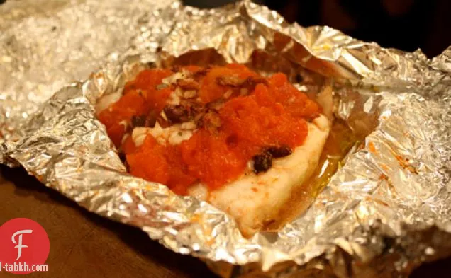 عشاء الليلة: سمك النهاش الأحمر مع الطماطم والزيتون خبز في احباط