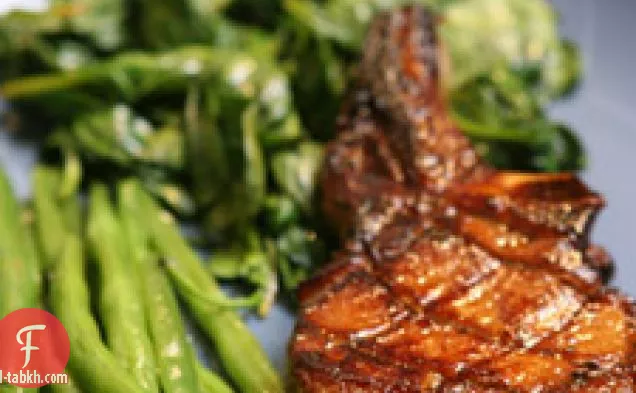 شرائح لحم الخنزير المتبلة بالدم والبرتقال