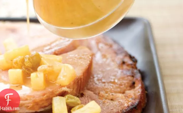 شريحة لحم الخنزير مع الصقيل البرتقالي