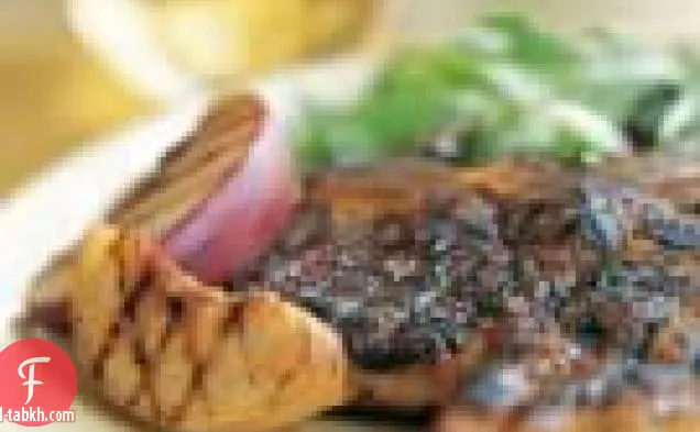 شرائح لحم الخنزير مع الخوخ