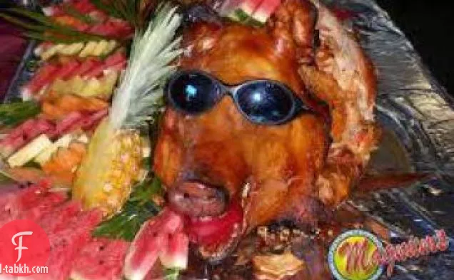 خنزير مشوي كامل