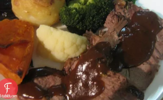 شرائح لحم الضأن المشوي مع صلصة الخوخ الدافئة